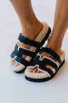 The Alpine Faux Shearling Sandal in Black