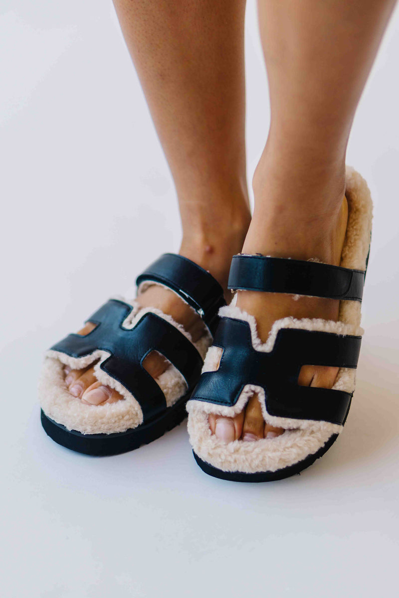 The Alpine Faux Shearling Sandal in Black