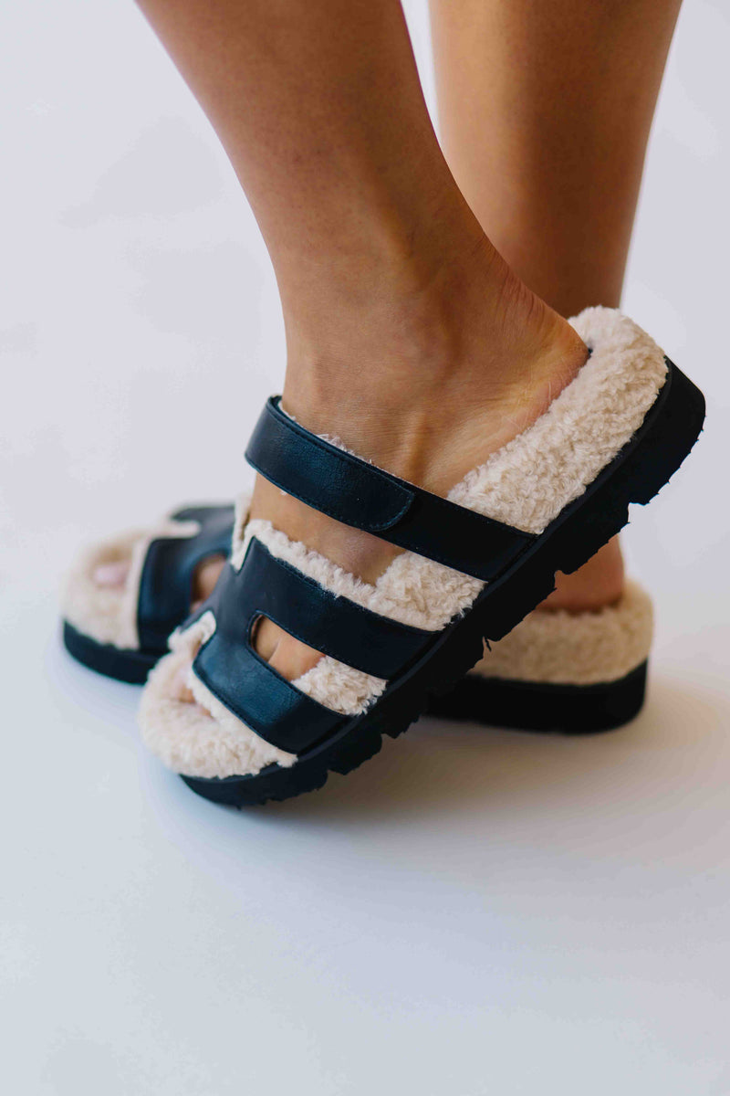 The Alpine Faux Shearling Sandal in Black