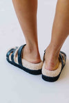 The Alpine Faux Shearling Sandal in Black