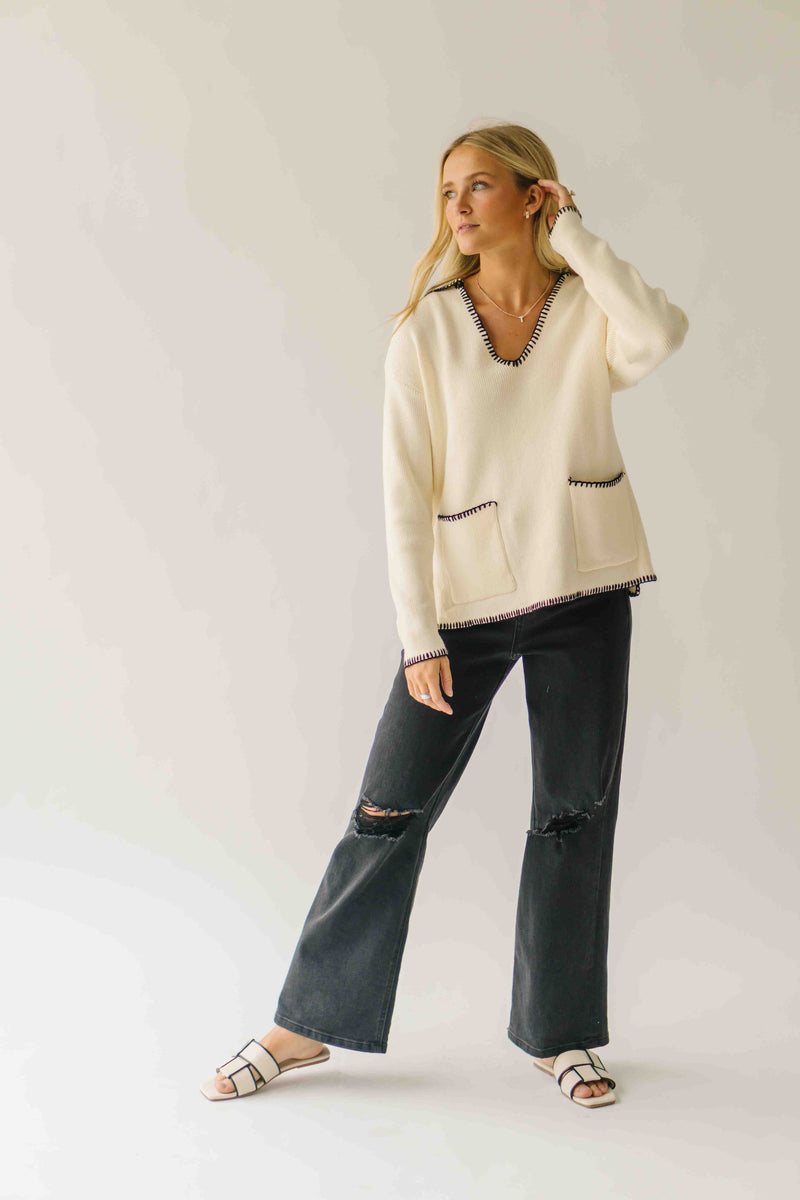 The Dollen Contrast Stitched Sweater in Ivory + Black