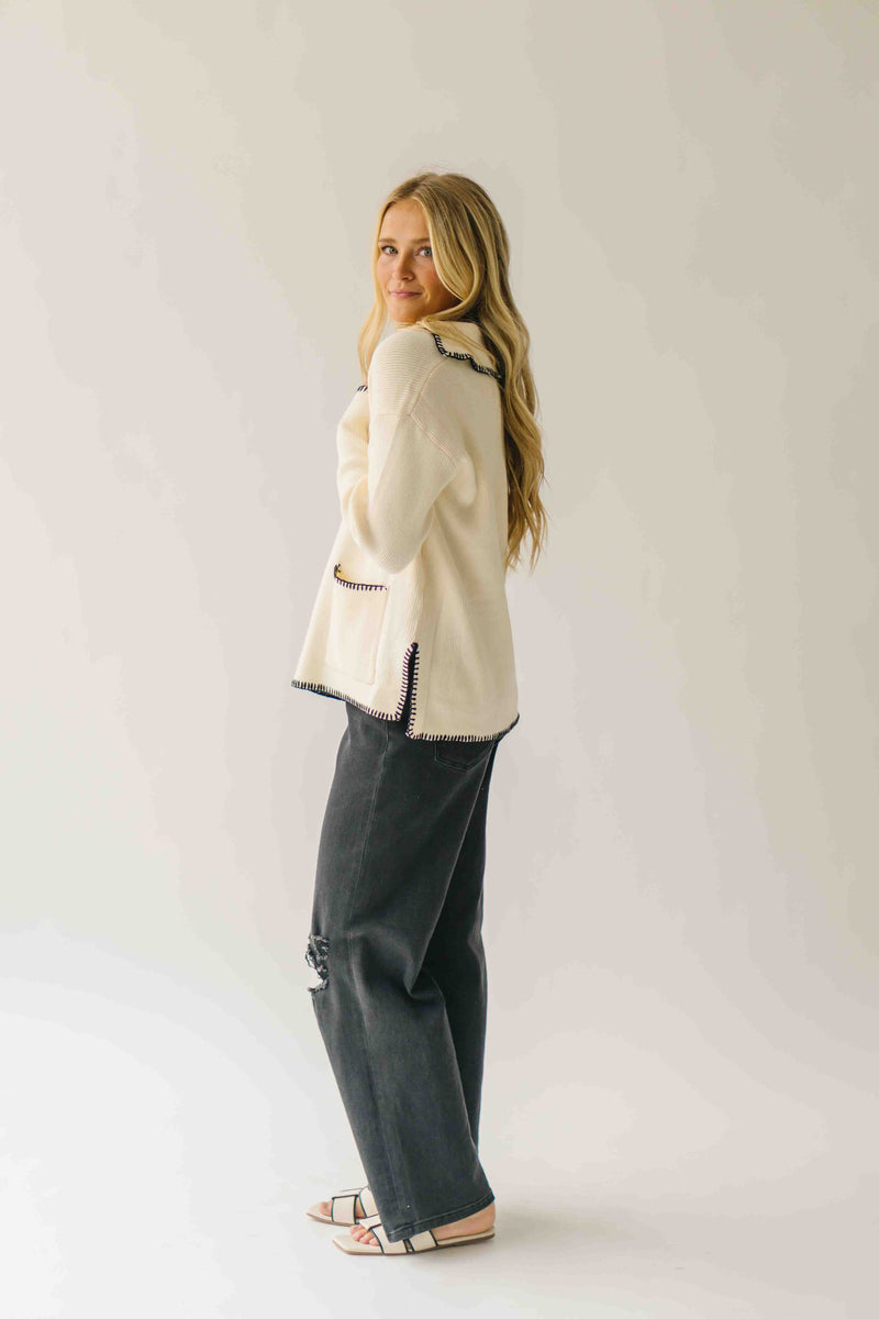 The Dollen Contrast Stitched Sweater in Ivory + Black