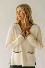 The Dollen Contrast Stitched Sweater in Ivory + Black