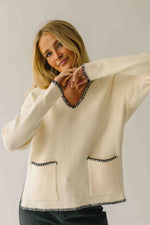 The Dollen Contrast Stitched Sweater in Ivory + Black