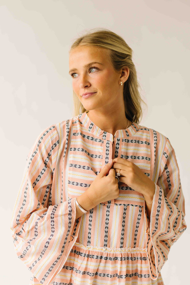 The Reeves Patterned V-Neck Dress in White + Peach