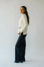 The Dollen Contrast Stitched Sweater in Ivory + Black