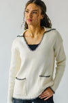 The Dollen Contrast Stitched Sweater in Ivory + Black