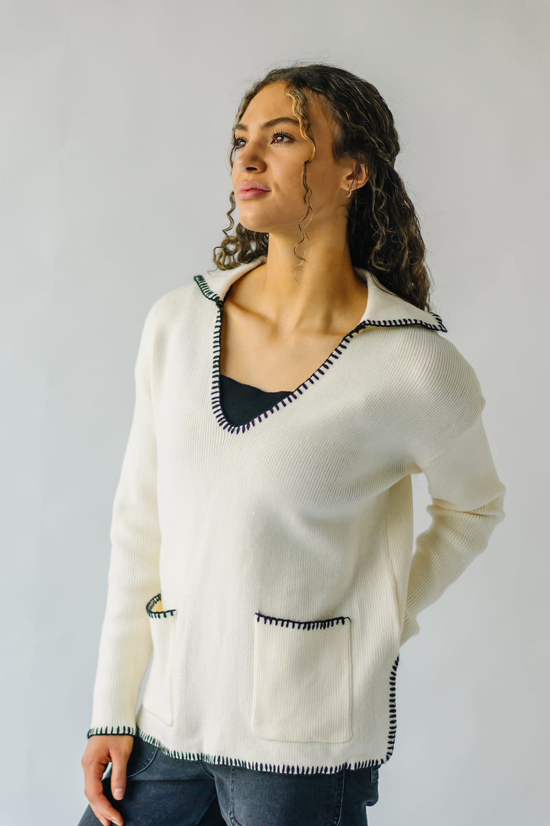 The Dollen Contrast Stitched Sweater in Ivory + Black