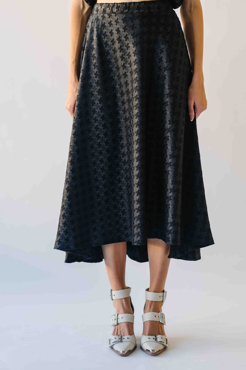 The Brewster Houndstooth Midi Skirt in Black
