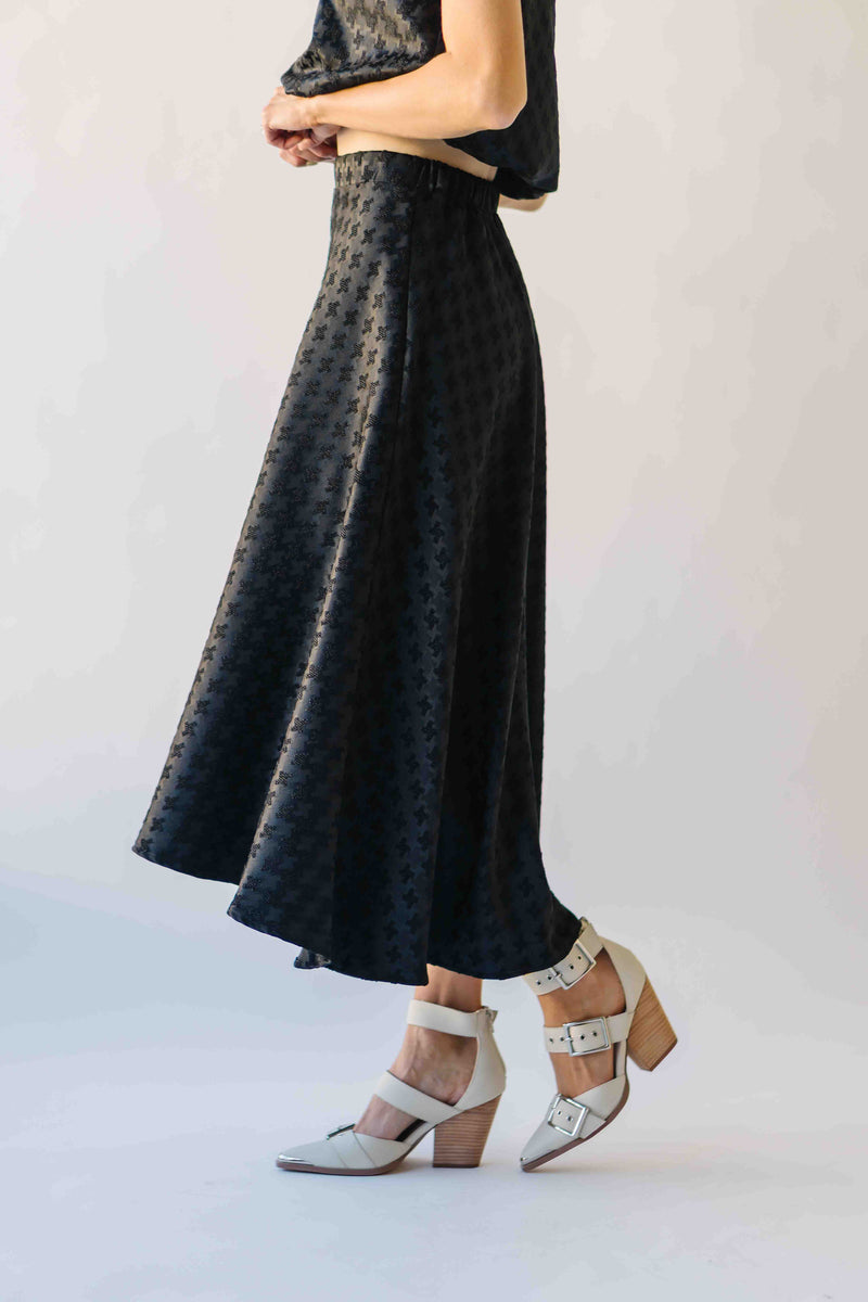 The Brewster Houndstooth Midi Skirt in Black