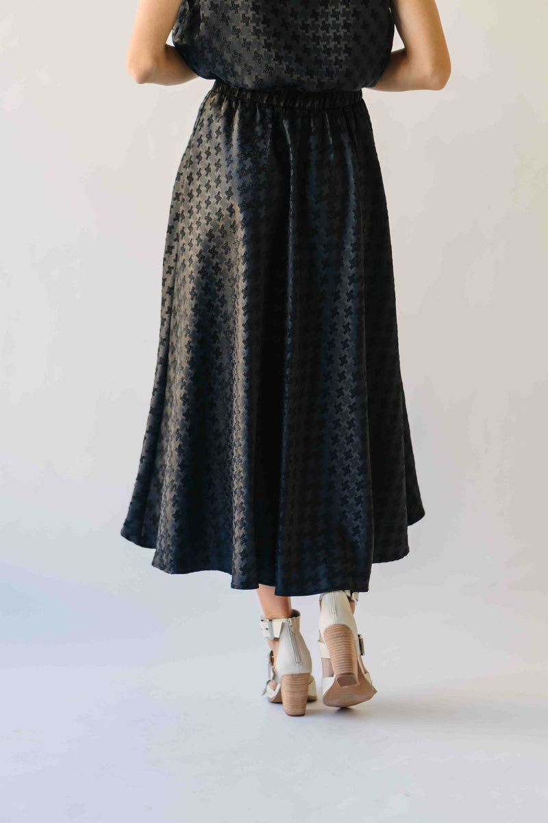 The Brewster Houndstooth Midi Skirt in Black