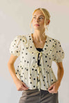 The Carlota Tie Front Polka Dot Blouse in Ivory