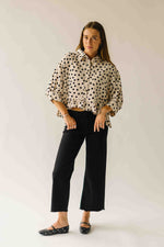 The Marla Polka Dot Peplum Blouse in Off White + Black