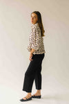The Marla Polka Dot Peplum Blouse in Off White + Black