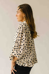 The Marla Polka Dot Peplum Blouse in Off White + Black