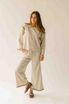 The Lyla Ruffle Edge Striped Pant in Cream + Brown