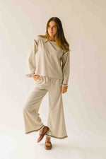 The Lyla Ruffle Edge Striped Pant in Cream + Brown