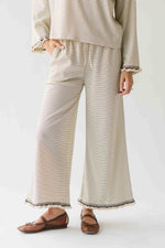 The Lyla Ruffle Edge Striped Pant in Cream + Brown
