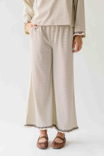 The Lyla Ruffle Edge Striped Pant in Cream + Brown