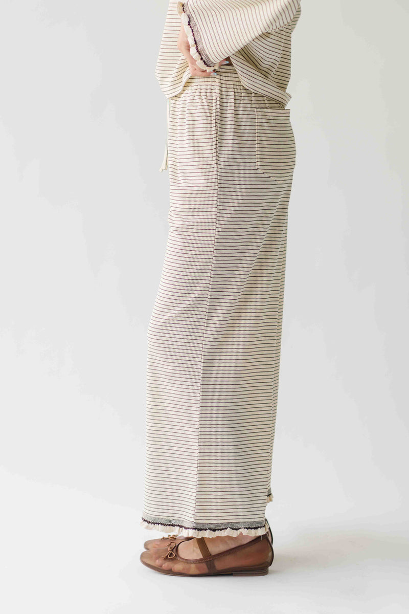 The Lyla Ruffle Edge Striped Pant in Cream + Brown