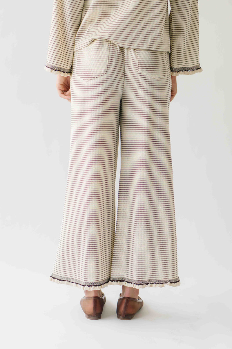 The Lyla Ruffle Edge Striped Pant in Cream + Brown