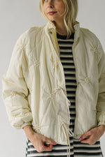 The Tarbet Floral Print Puffer Jacket in Cream