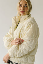 The Tarbet Floral Print Puffer Jacket in Cream