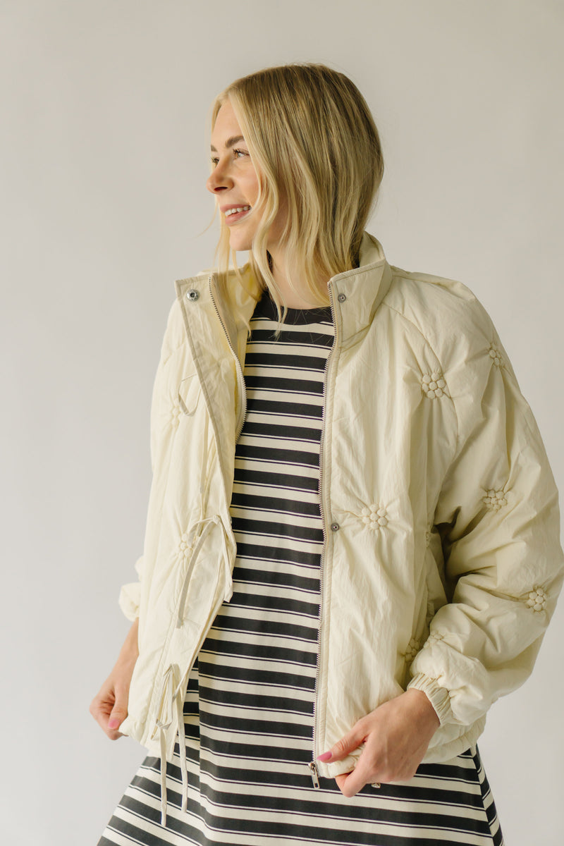 The Tarbet Floral Print Puffer Jacket in Cream