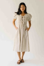 The Jericka Smocked Midi Dress in Oatmeal Stripe