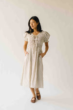 The Jericka Smocked Midi Dress in Oatmeal Stripe