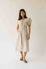 The Jericka Smocked Midi Dress in Oatmeal Stripe