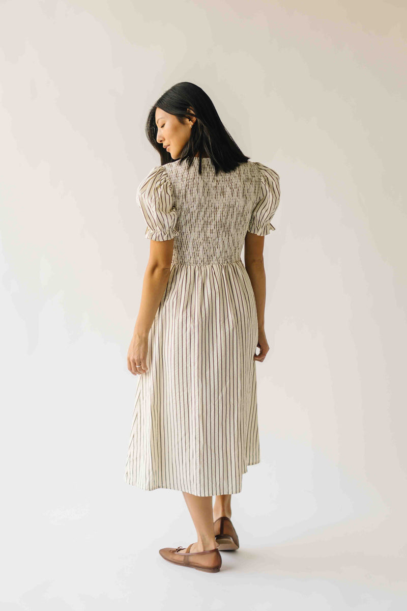 The Jericka Smocked Midi Dress in Oatmeal Stripe