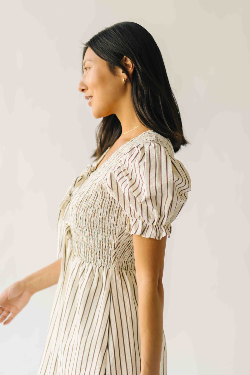 The Jericka Smocked Midi Dress in Oatmeal Stripe