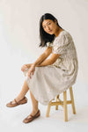 The Jericka Smocked Midi Dress in Oatmeal Stripe