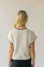 The Shelly Scallop Edge Sweater in Ivory + Black