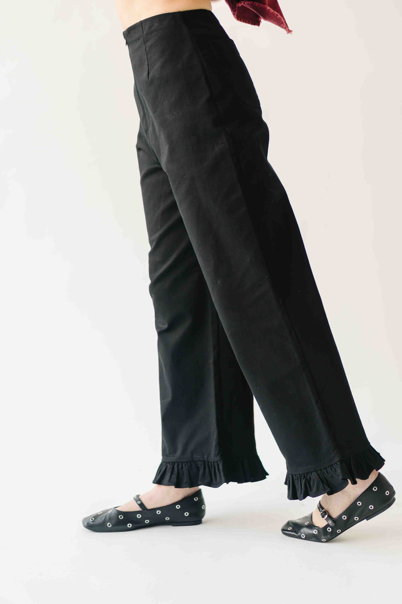 The Layna Ruffle Hem Pant in Black