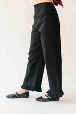 The Layna Ruffle Hem Pant in Black