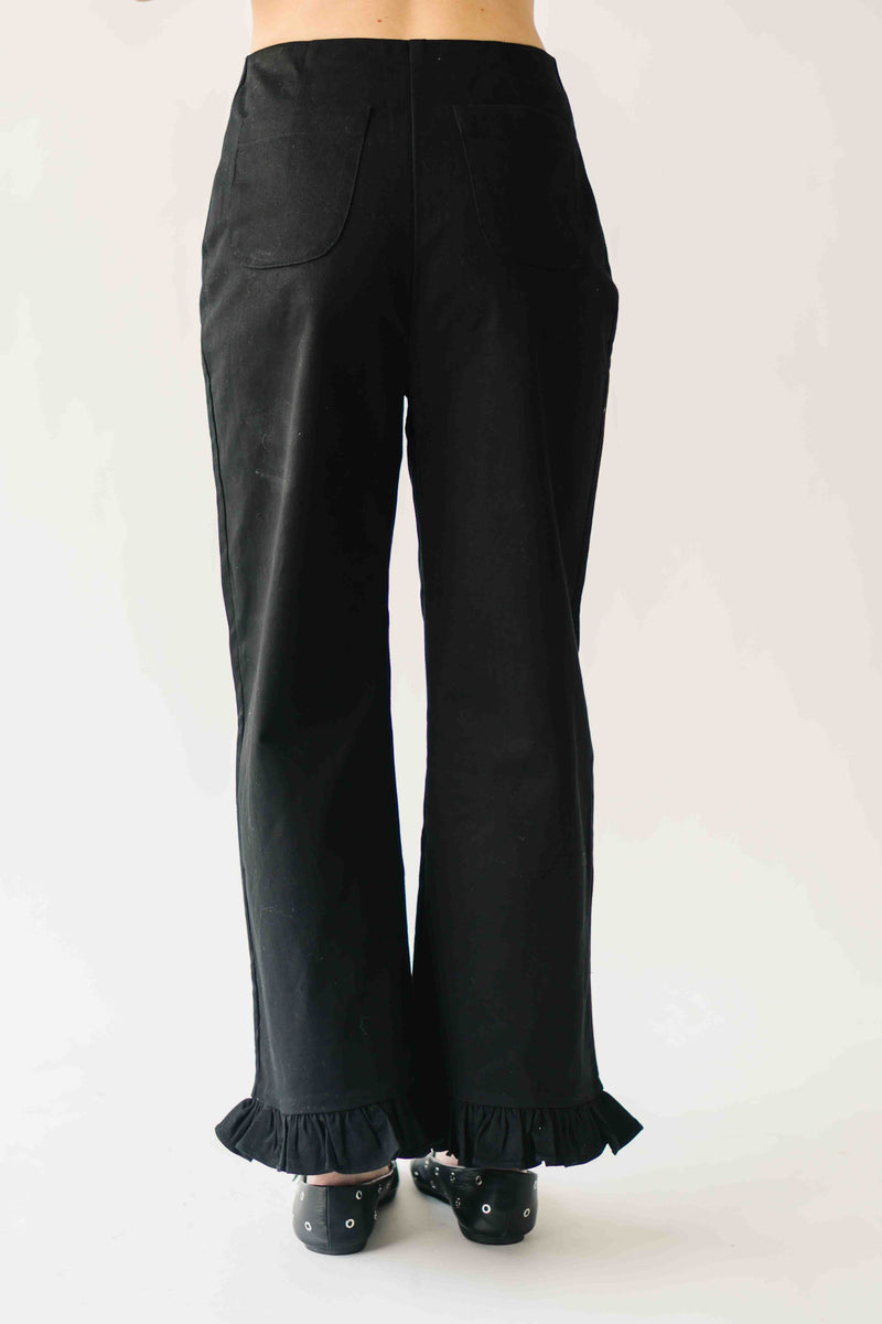 The Layna Ruffle Hem Pant in Black