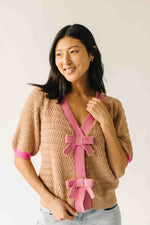 The Richey Bow Cardigan in Mocha + Pink