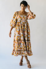 The Penner Square Neck Floral Midi Dress in Rust