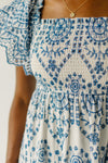 The Palmetto Smocked Detail Midi Dress in White + Blue