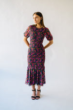 The Jacklin Smocked Floral Dress in Black Multi