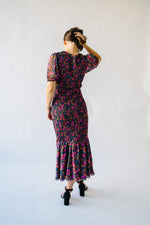 The Jacklin Smocked Floral Dress in Black Multi