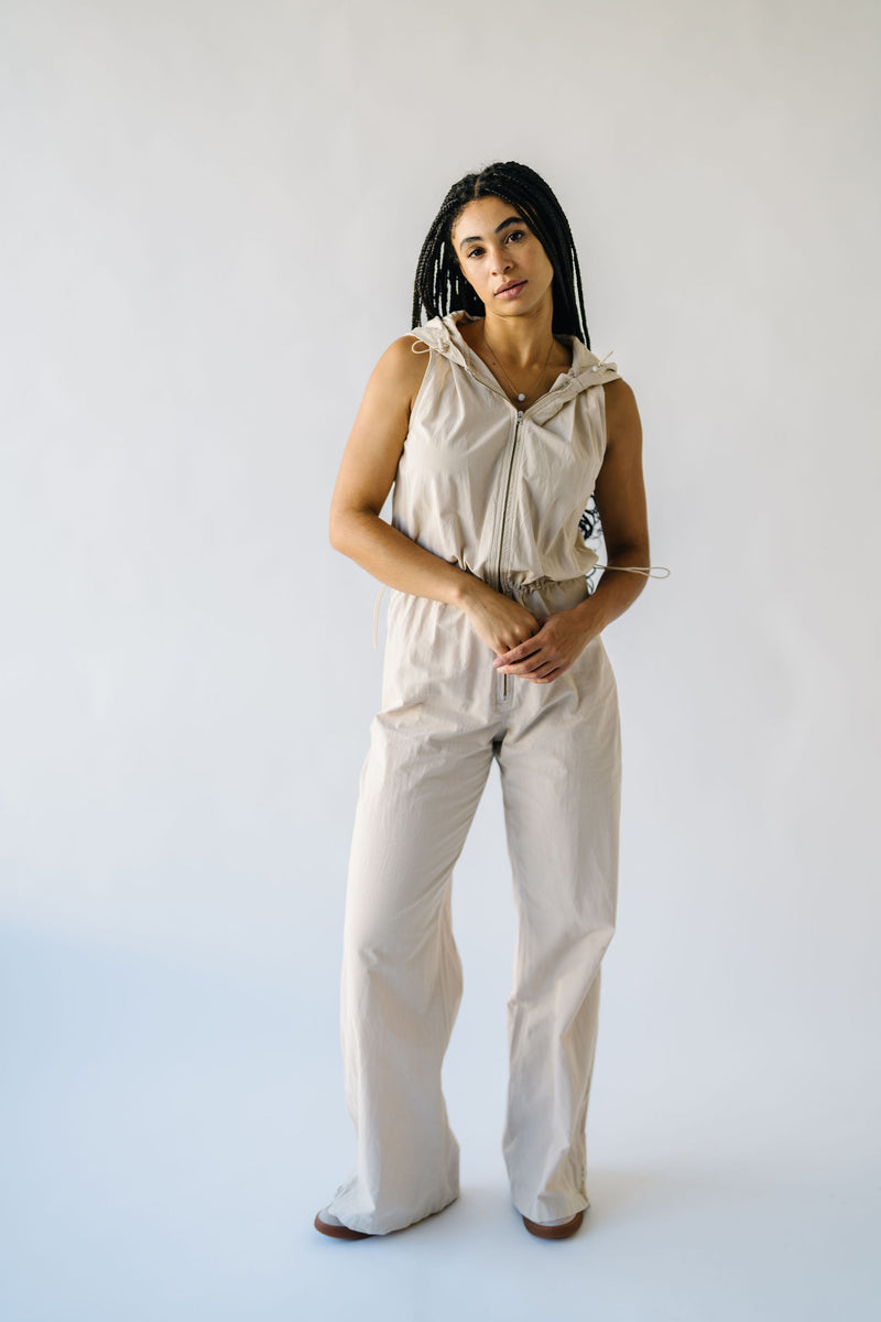 The Calvert Drawstring Hooded Jumpsuit in Tan