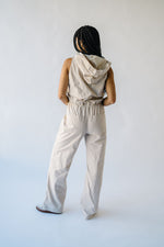 The Calvert Drawstring Hooded Jumpsuit in Tan