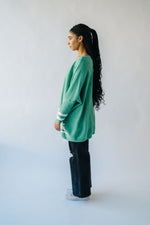 The Donakey Batwing Striped Sweater in Jade + Ivory