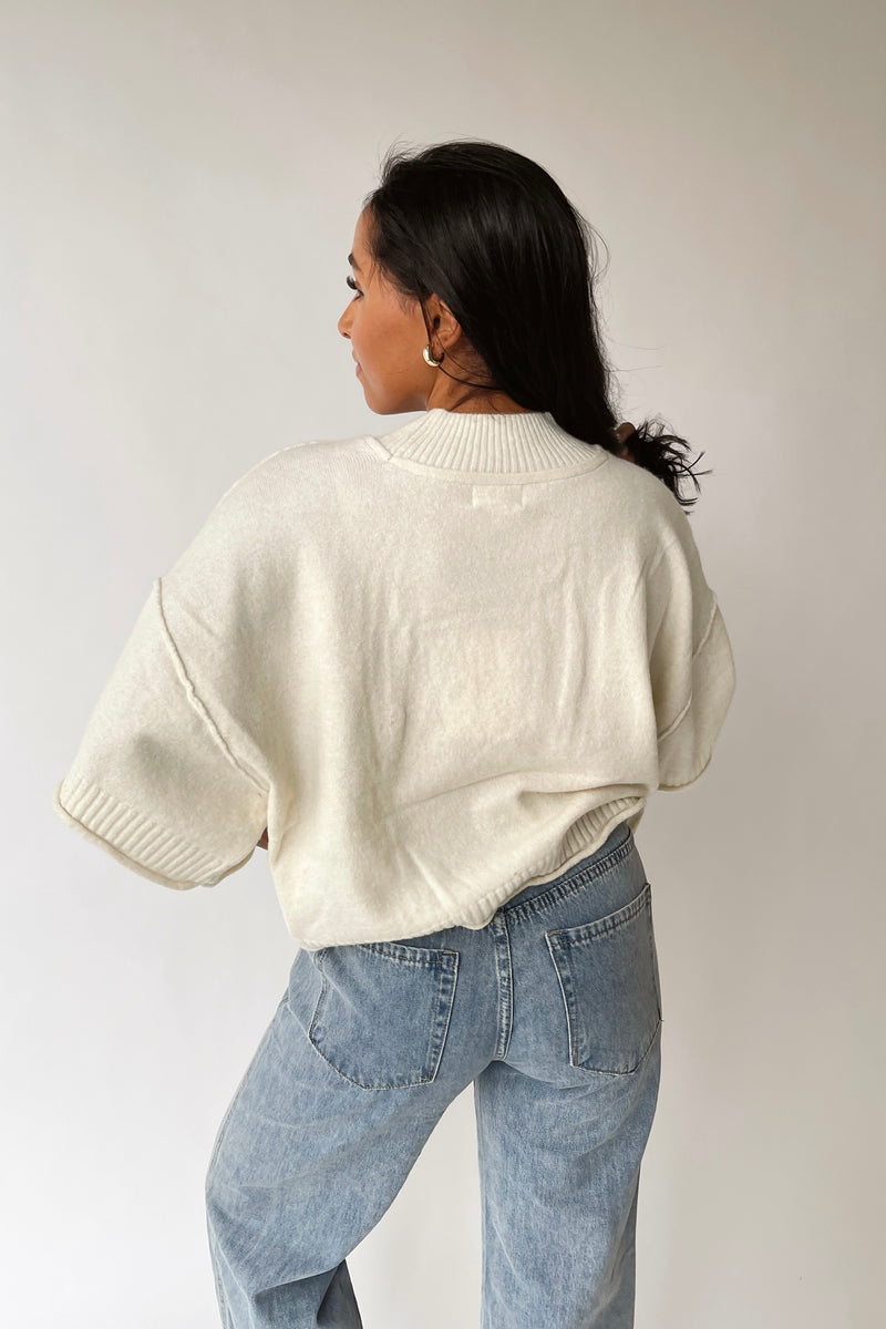 The Trisney Mock Neck Sweater in Ivory