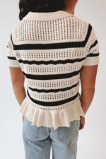 The Nixon Knit Ruffle Hem Sweater in Black Stripe