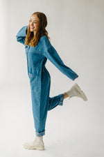 The Adeline Button-Down Jumpsuit in Washed Denim