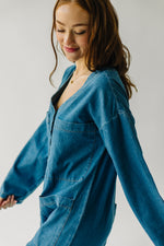The Adeline Button-Down Jumpsuit in Washed Denim